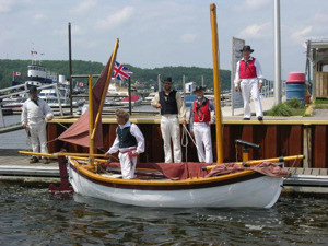 HMS Kingfisher, getting her dipping lug rigged along with retractable boomkin and bow sprit